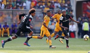 Hendrick Ekstein challenged by Issa Sarr and Thabo Matlaba