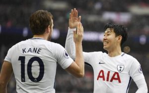Tottenham Hotspur's Harry Kane with teammate Son Heung-min.