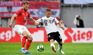 Austria's Peter Zulj in action against Joshua Kimmich of Germany