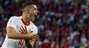 Granit Xhaka of Switzerland celebrates scoring against Serbia.