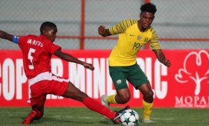 Lyle Foster of Amajita evades a challenge from Jordan Francois of Mauritius