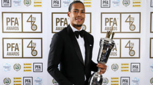 Liverpool's Virgil van Dijk poses with his PFA Player of the Year award