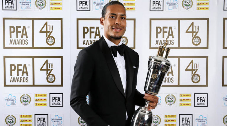 Liverpool's Virgil van Dijk poses with his PFA Player of the Year award