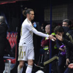 Real Madrid's Gareth Bale walks out of the pitch after being substituted during the Spanish La Liga soccer match between Osasuna and Real Madrid at El Sadar stadium in Pamplona, northern Spain, Sunday, Feb. 9, 2020. (AP Photo/Alvaro Barrientos)
