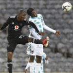 Bathusi Aubass of TS Galaxy challenges Terrence Dzukamanja of Orlando Pirates