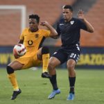 Cheslyn Jampies of Sekhukhune United FC challenges Nkosingiphile Ngcobo of Kaizer Chiefs