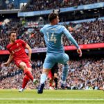 Jota of Liverpool scoring against Manchester City