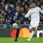 MADRID, SPAIN - NOVEMBER 26: Kylian Mbappe of Paris Saint-Germain is put under pressure by Casemiro of Real Madrid during the UEFA Champions League group A match between Real Madrid and Paris Saint-Germain at Bernabeu on November 26, 2019 in Madrid, Spain. (Photo by Angel Martinez/Getty Images)