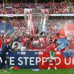 LONDON, ENGLAND - MAY 29: Lewis Grabban of Nottingham forest lifts the trophy following their team's victory in the Sky Bet Championship Play-Off Final match between Huddersfield Town and Nottingham Forest at Wembley Stadium on May 29, 2022 in London, England. (Photo by Christopher Lee/Getty Images)