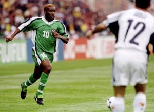 13 Jun 1998: Jay Jay Austin Okocha of Nigeria in action during the World Cup first round match against Spain at the Stade de la Beaujoire in Nantes, France. Nigeria won the match 3-2. Mandatory Credit: Shaun Botterill/Allsport