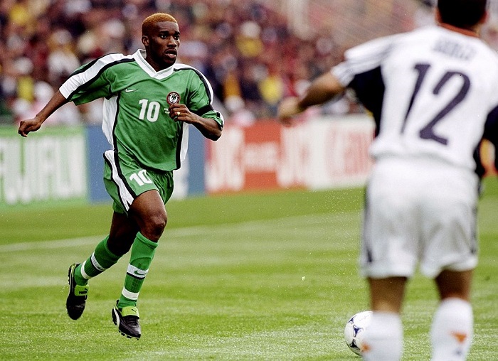 13 Jun 1998: Jay Jay Austin Okocha of Nigeria in action during the World Cup first round match against Spain at the Stade de la Beaujoire in Nantes, France. Nigeria won the match 3-2. Mandatory Credit: Shaun Botterill/Allsport