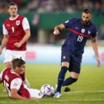 VIENNA, AUSTRIA - JUNE 10: Karim Benzema of France battles for possession with Maximilian Woeber of Austria during the UEFA Nations League - League A Group 1 match between Austria and France at Ernst Happel Stadion on June 10, 2022 in Vienna, Austria. (Photo by Christian Hofer/Getty Images)