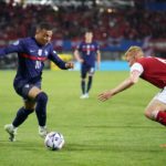 VIENNA, AUSTRIA - JUNE 10: Kylian Mbappe of France battles for possession with Nicolas Seiwald of Austria during the UEFA Nations League - League A Group 1 match between Austria and France at Ernst Happel Stadion on June 10, 2022 in Vienna, Austria. (Photo by Christian Hofer/Getty Images)