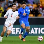 WOLVERHAMPTON, ENGLAND - JUNE 11: Jack Grealish of England battles for possession with Giovanni Di Lorenzo of Italy during the UEFA Nations League - League A Group 3 match between England and Italy at Molineux on June 11, 2022 in Wolverhampton, England. This game will be played behind closed doors following on from the Euro 2020 final. (Photo by Claudio Villa/Getty Images)