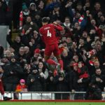Liverpool tame Wolves to climb into top six