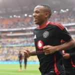 JOHANNESBURG, SOUTH AFRICA - MARCH 16: Relebohile Mofokeng of Orlando Pirates celebrates scoring a goal with teammates during the Betway Premiership match between Orlando Pirates and Mamelodi Sundowns at FNB Stadium on March 16, 2025 in Johannesburg, South Africa. (Photo by Lefty Shivambu/Gallo Images)