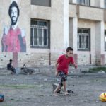 Salah admired from afar in home village as club tensions swirl