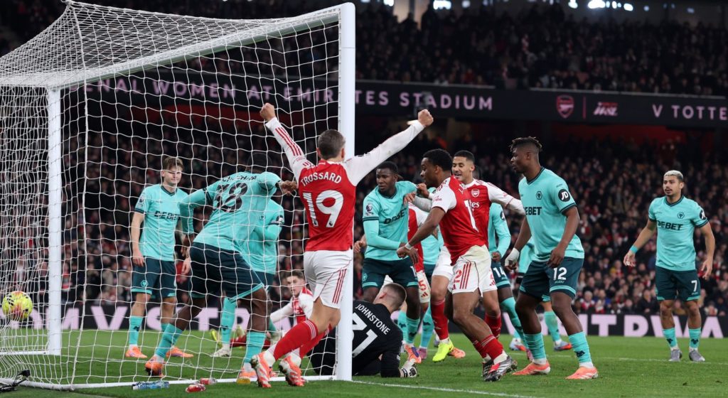 Two own goals save Arsenal blushes against Wolves