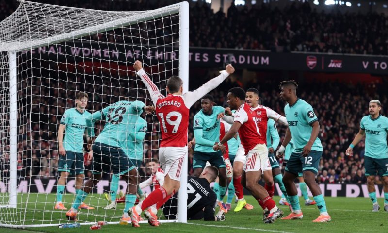 Two own goals save Arsenal blushes against Wolves