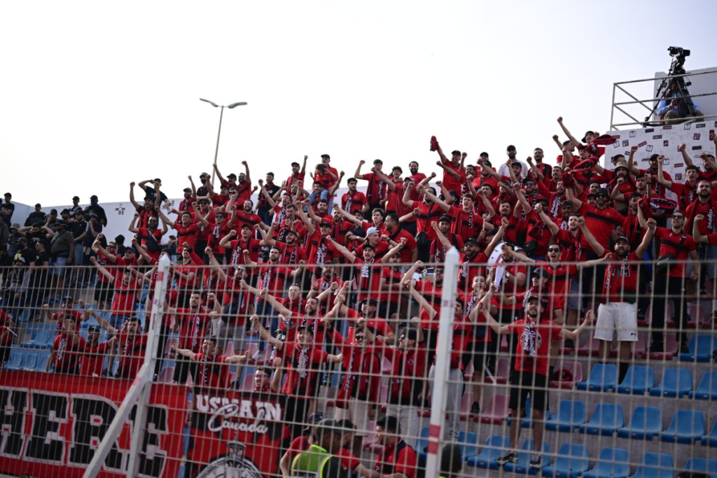 Pitch invasion throws CAF semi-final into chaos