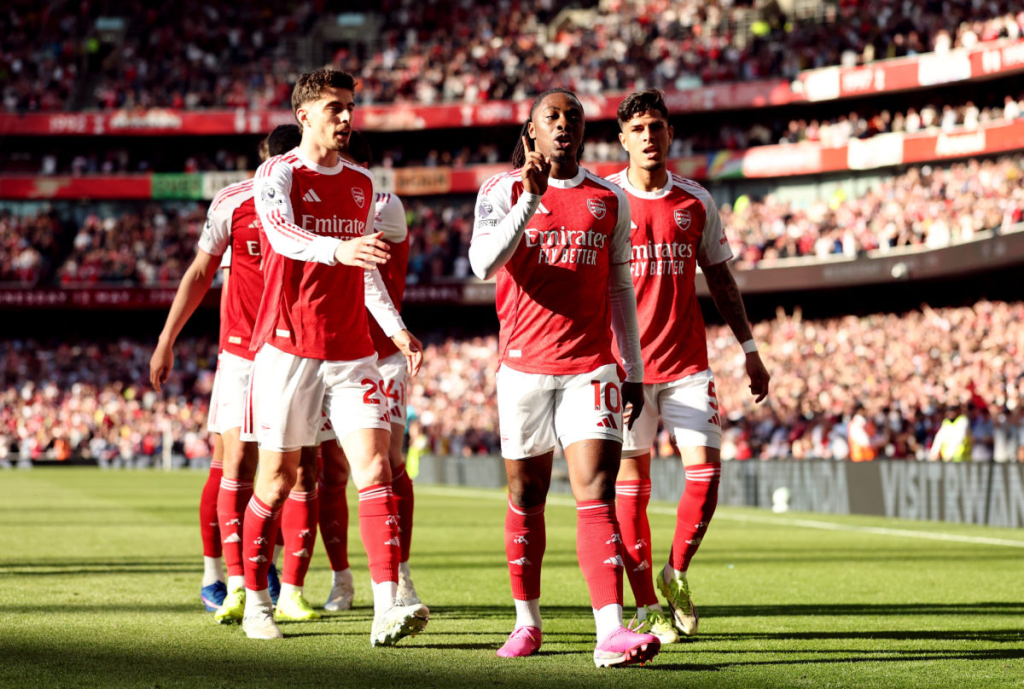 Arsenal reclaim top spot as Spurs revive hope