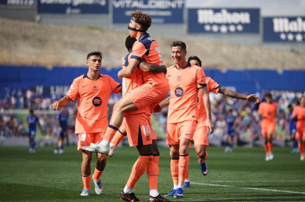 Barcelona on brink of title, Atletico gain momentum
