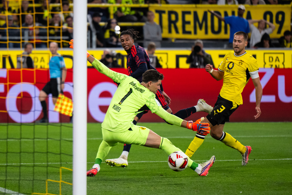 Olise leads Bayern past old rivals Dortmund