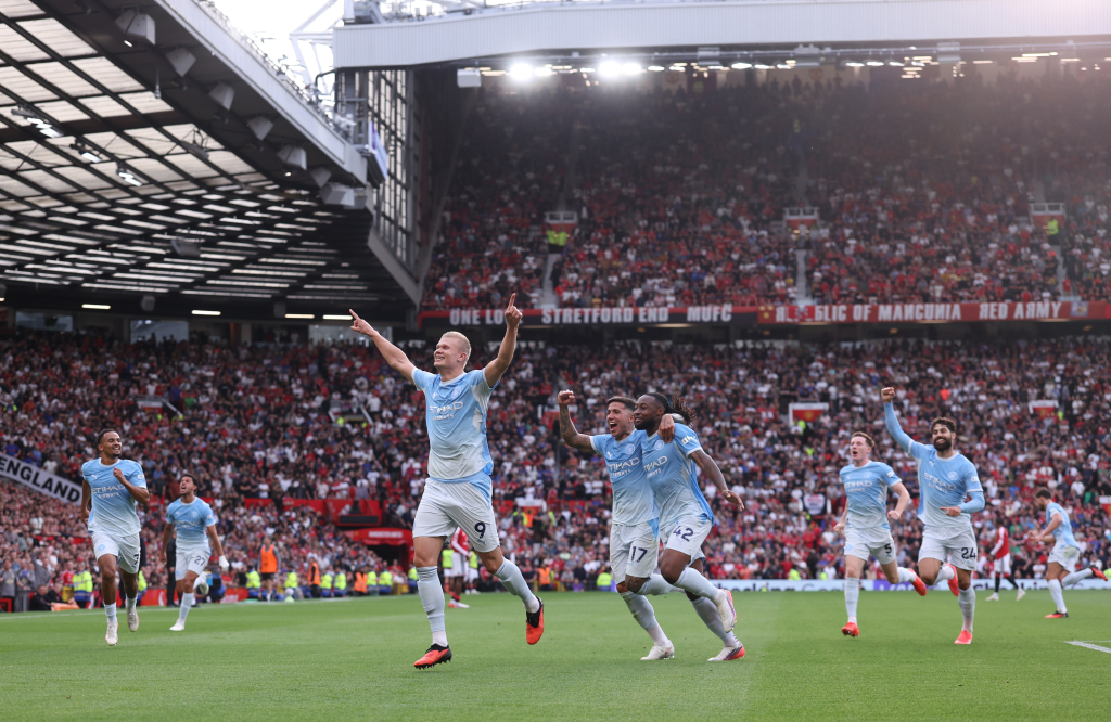 Haaland lifts 10-man City past United