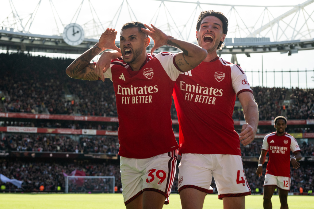 Guimaraes fires Arsenal to comeback win over Leeds